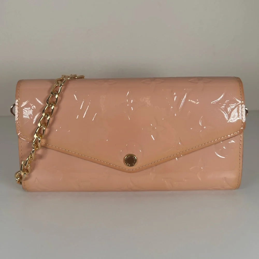 Authentic Louis Vuitton Vernis pink Sarah wallet